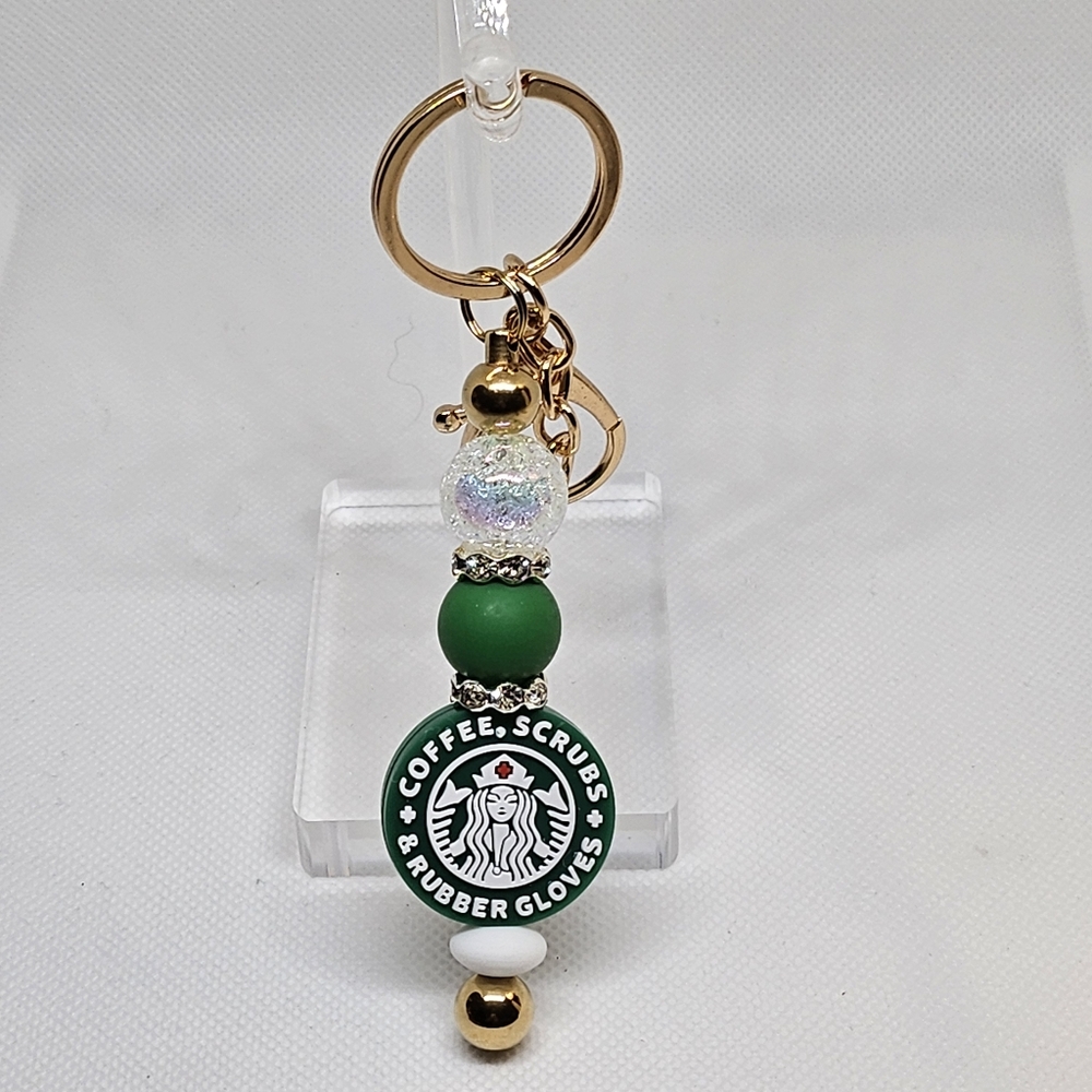 NWT Coffee Scrubs and Rubber Gloves Beaded Goldtone Medal Keychain